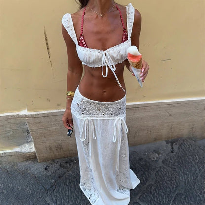Crop top and maxi skirt set featuring lace trim and tie front details