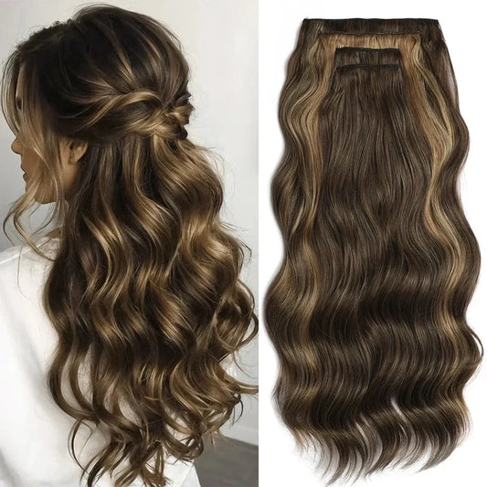 Brown and blonde highlighted wavy hair extensions shown on a person and isolated on white.