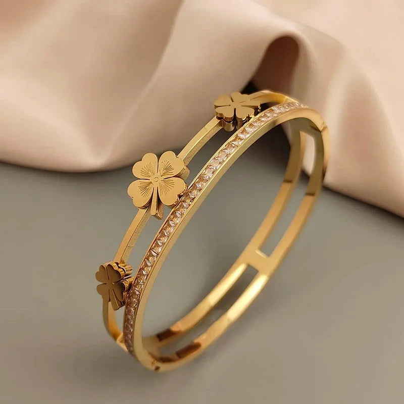 Women's clover charm bangle with crystal inlay