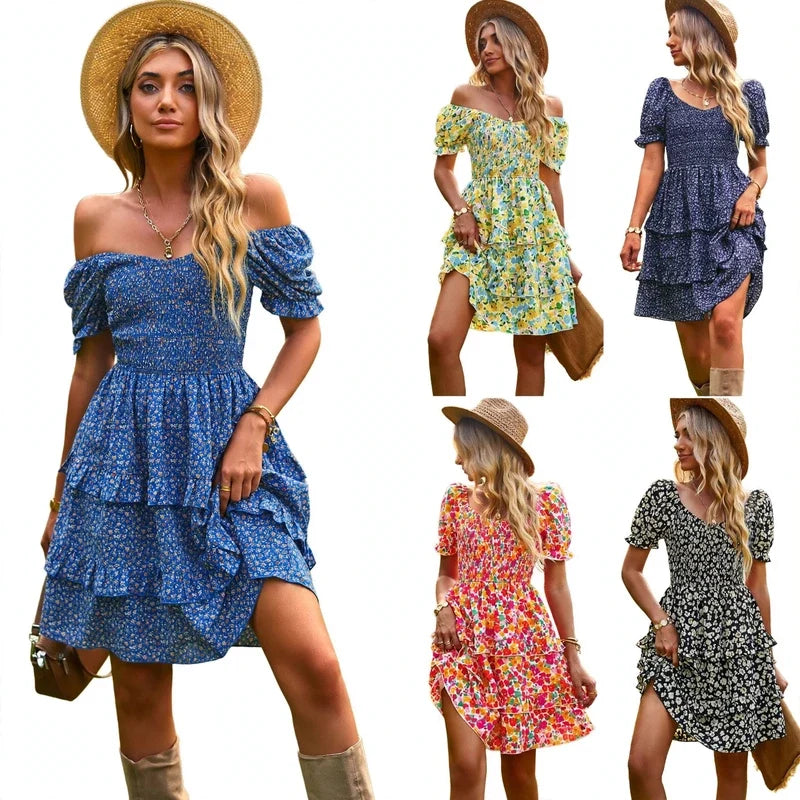 Woman wearing off-shoulder blue floral mini dress with tiered ruffles and straw hat.