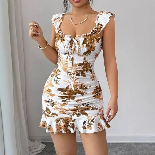 White mini sundress with brown floral print, square neckline, ruffle straps, drawstring bust, and ruched body.