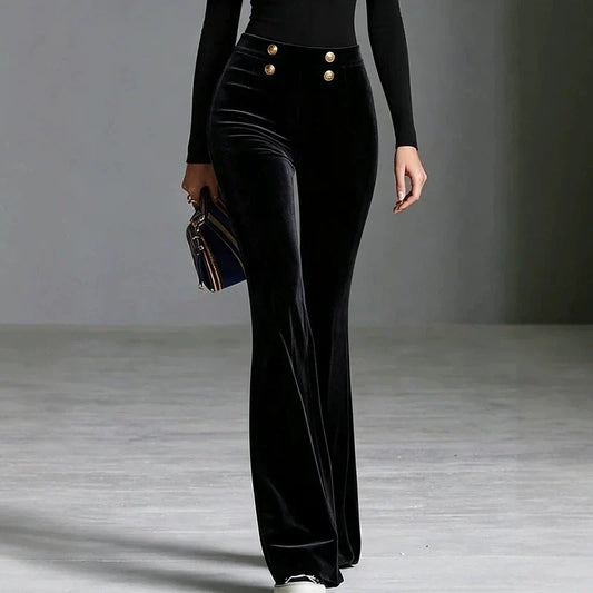 Black velvet high-waisted flare pants with double-breasted gold button accents.