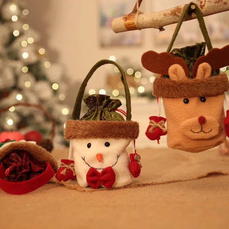 Christmas themed gift bags featuring snowman and reindeer designs with faux fur trim.