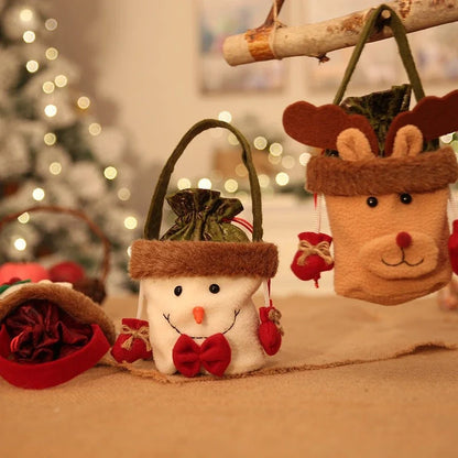 Christmas themed gift bags featuring snowman and reindeer designs with faux fur trim.