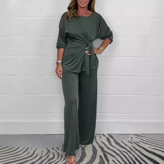 Dark green knit lounge set featuring a long-sleeve top with a side tie front and matching wide-leg pants.