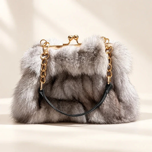 Fluffy grey fur evening handbag with a gold-tone kiss-lock frame and chain handle.
