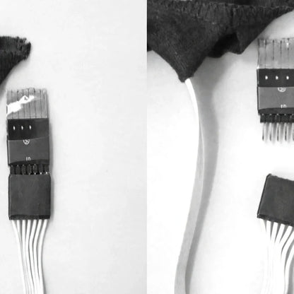 Close-up of LED shirt wiring harness and connector pins.