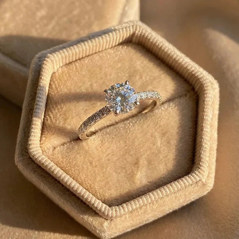 Slim pave band with round zirconia solitaire, side view