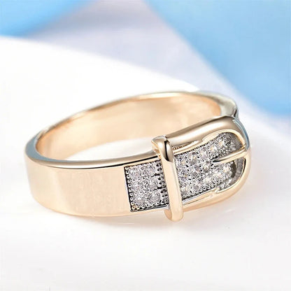 Gold-tone buckle band ring with pave zircon, side view