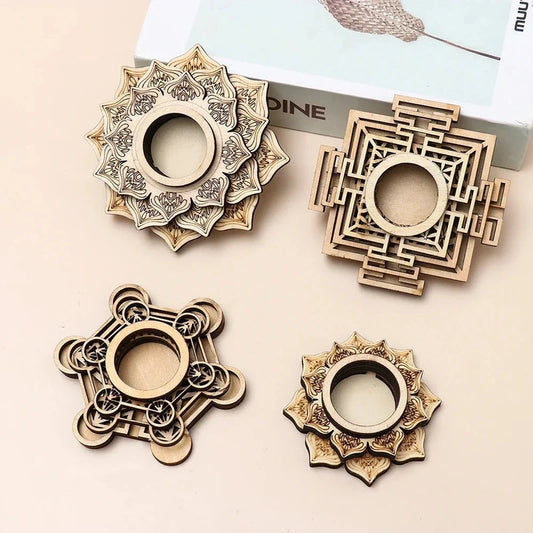 Four carved wooden display stands with intricate geometric and floral patterns and central circular holders.